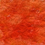 crumpled red and yellow painted paper texture