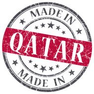 made in QATAR red grunge stamp isolated on white background