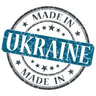 made in UKRAINE blue grunge stamp isolated on white background