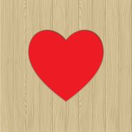 Hole in heart shape on wooden texture