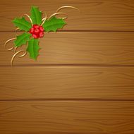 Christmas wooden background with holly berry