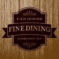 Vintage Dining Label on Aged Wood