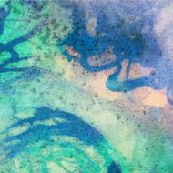 Abstract watercolor painting with blue green and purple