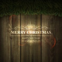 Merry Christmas lettering on Wooden background with garland