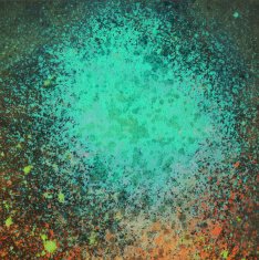 Splatter of blue turquoise paint on a dark background