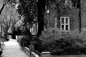 black and white picture of a brick house