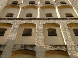 old masonry facade with windows