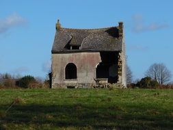 abandoned house with fallen roof