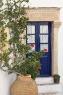 house with blue door in greece