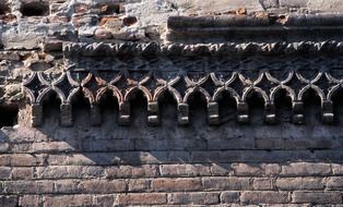 Old brick wall with patterns