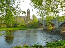 River and ancient church in a village