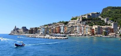 view from the water to port venere on a sunny day