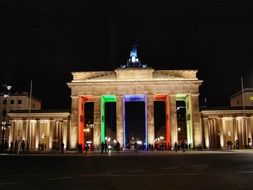 Illuminated Brandenburg gate in Berlin at night