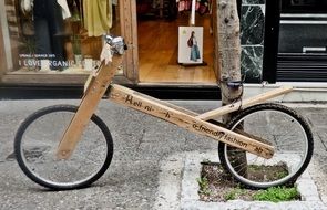 wooden bike near the tree