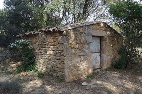 small stone house in a village