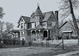 black and white photo of a two-story house