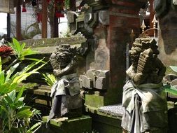 ancient statues in buddhist temple in thailand