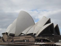 concert building of opera house at clouds, australia, sydney