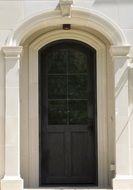 arched doorway for entrance doors