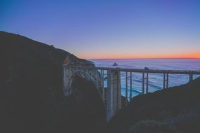 arch bridge at the sunset