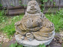small stone statue of a buddha