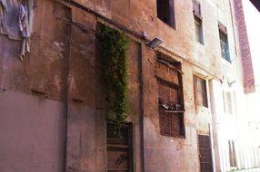 old building with bars in Barcelona