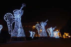 glowing figures of angels in Bydgoszcz, Poland