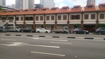 cars parked near shops in singapore