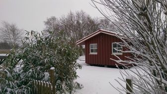 Cottages in Wintry countryside