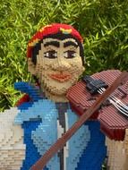 sculpture of the musician from Lego blocks