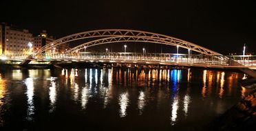 illuminated bridge over the river in Pontevedra at night