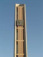 steeple with clock on a sky background