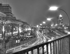 black and white photo of the night highway in hamburg