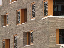 gray house with windows close-up