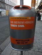 garbage can on a street in vienna