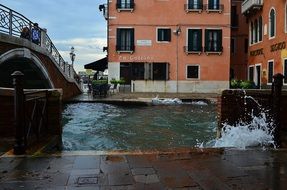 splashes on a canal in Venice