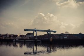 crane building above a river
