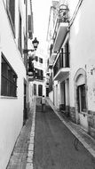 walk through the old narrow spain sitges street