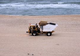 sweeper on the beach