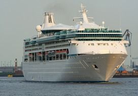 cruise ship in view of harbor at twilight, germany, hamburg