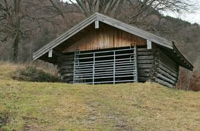 corral on a green hill