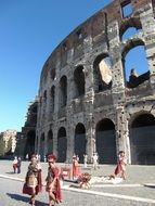 Historical characters at Roman colosseum, Italy