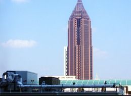 high-rise building of a skyscraper against a blue sky