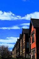 landscape of houses and clouds