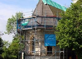 old house in scaffolding