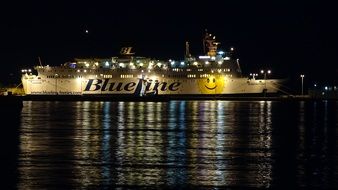 ferry in night lighting on the water in croatia