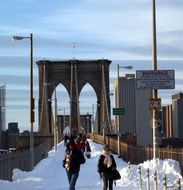 people in the winter at Brooklyn Bridge