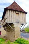 wooden barn built on stilts