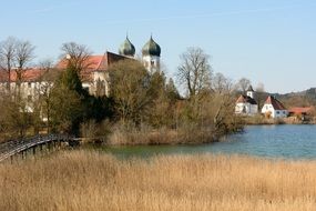 monastery church in autunum landscape, germany, seeon