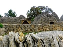 stone buildings among nature